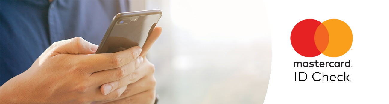 person using their mobile device and the mastercard logo